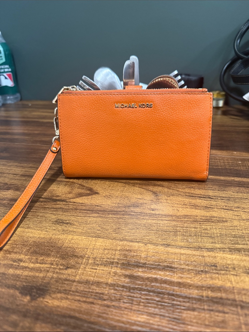 Michael Kors Orange Leather Wristlet Clutch with Gold Logo